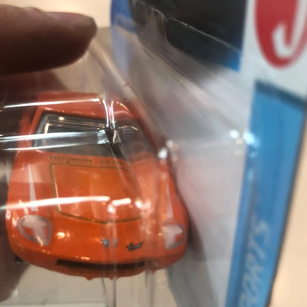 Orange and White 1968 Mazda Cosmo Sport